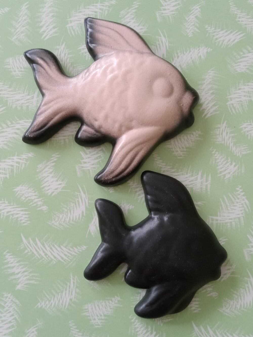 2 vintage MCM Fish Plaque Wall Pink and Black chalkware 1950 1960